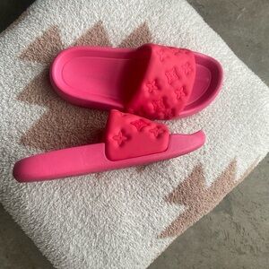 Pink embroidered slides